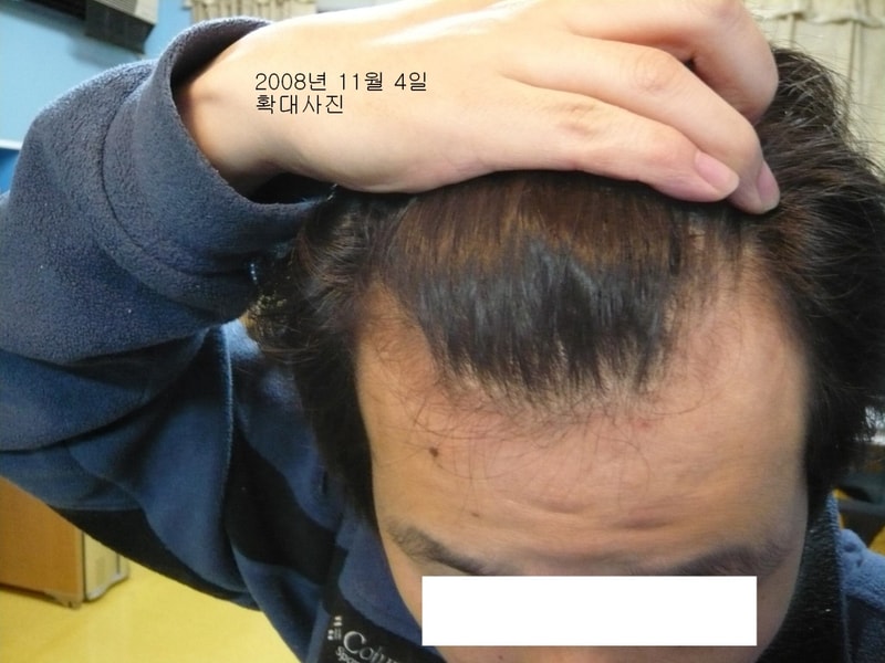 확대081104.jpg